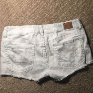 American Eagle white distressed shorts